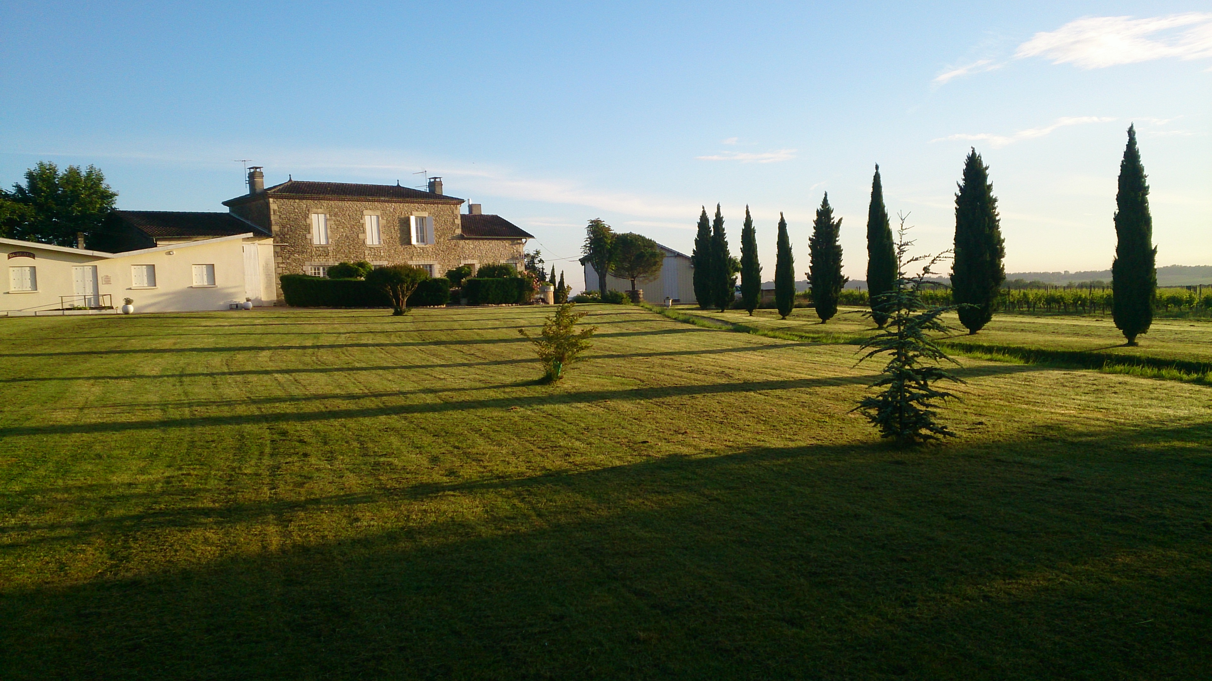 The stone house where we are staying and the huge lawn in front of it