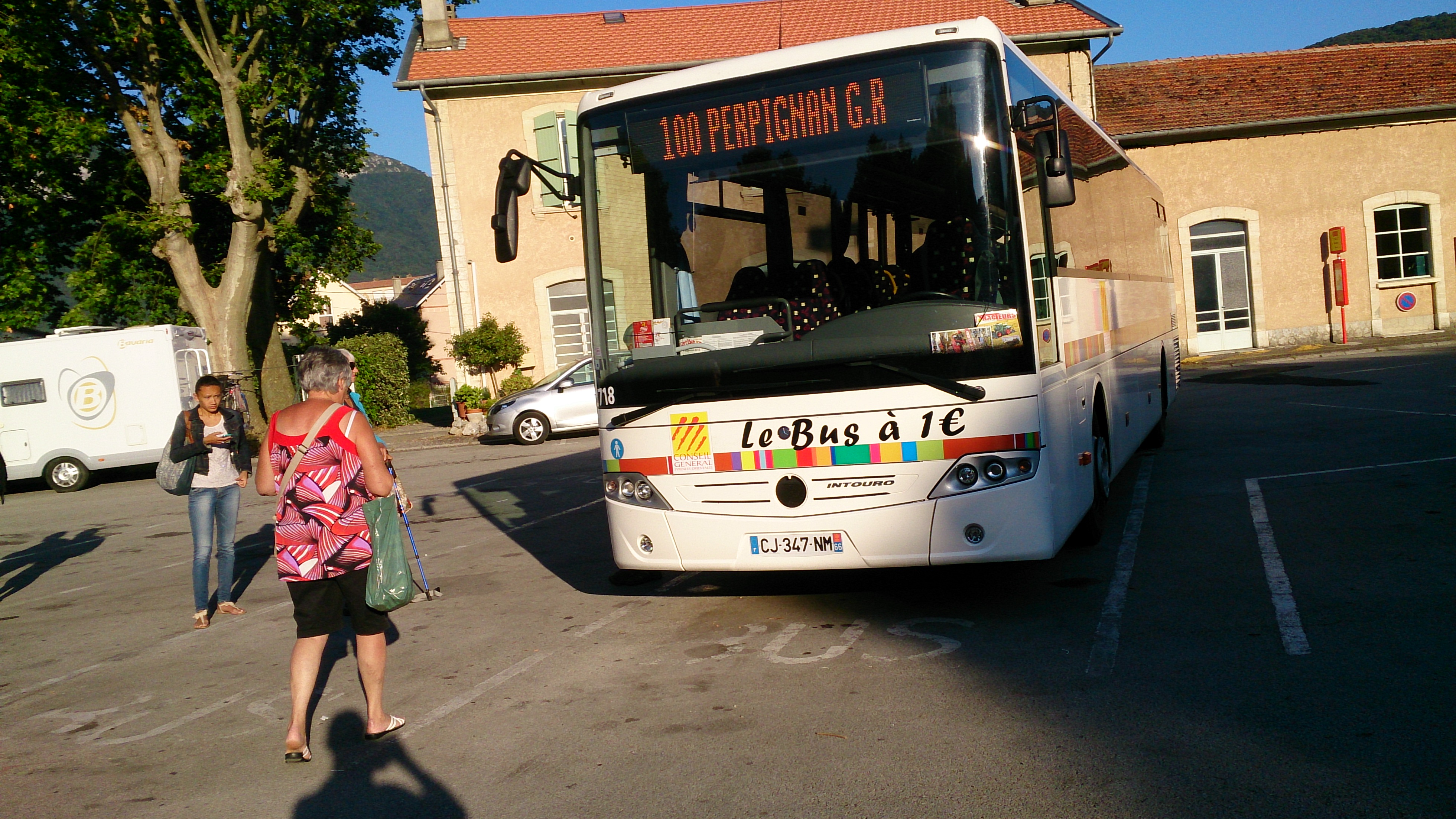 The morning bus to Perpignan ready to leave from the railway station at Quillan